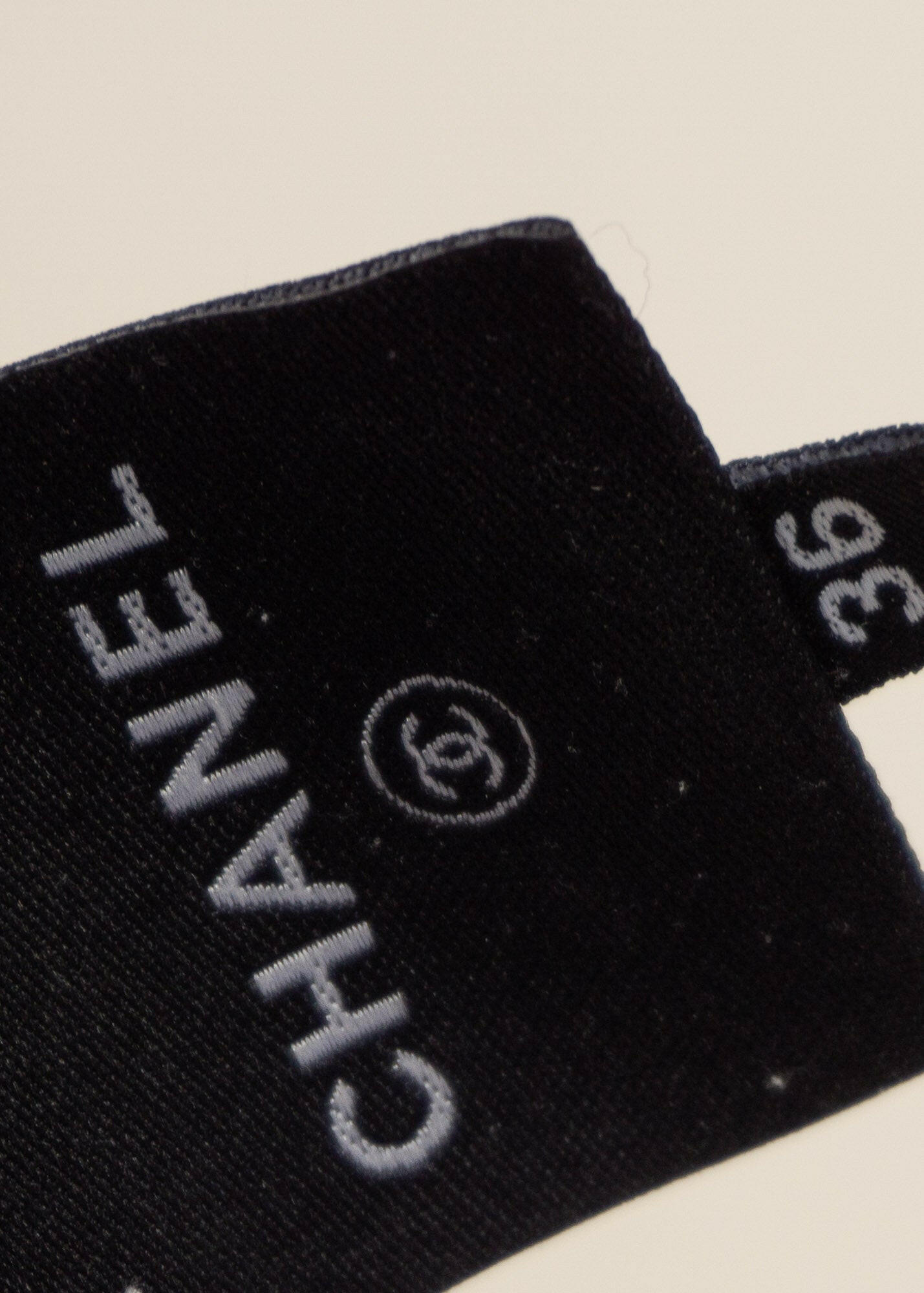FR38-40 Chanel Spring 2009 Perforated Camellia Interlocking-C Logo Pattern Windbreaker - Vintage Chanel Jacket - - Rarchive.