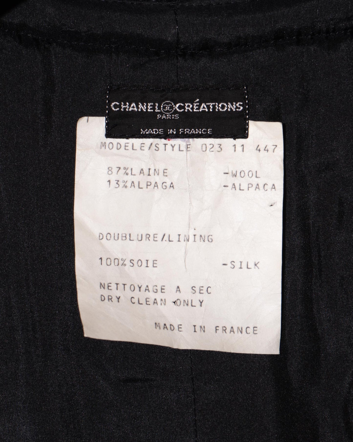 FR40-42 Rare Chanel 1970s Colorless Two Pocket Black Wool Tweed Jacket